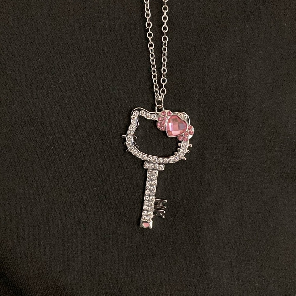 Hello Kitty Pink Crystal Key Necklace. NWOT. 24” 925 chain. Super Sparkly.